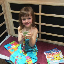 little girl enjoying the use of an infrared sauna