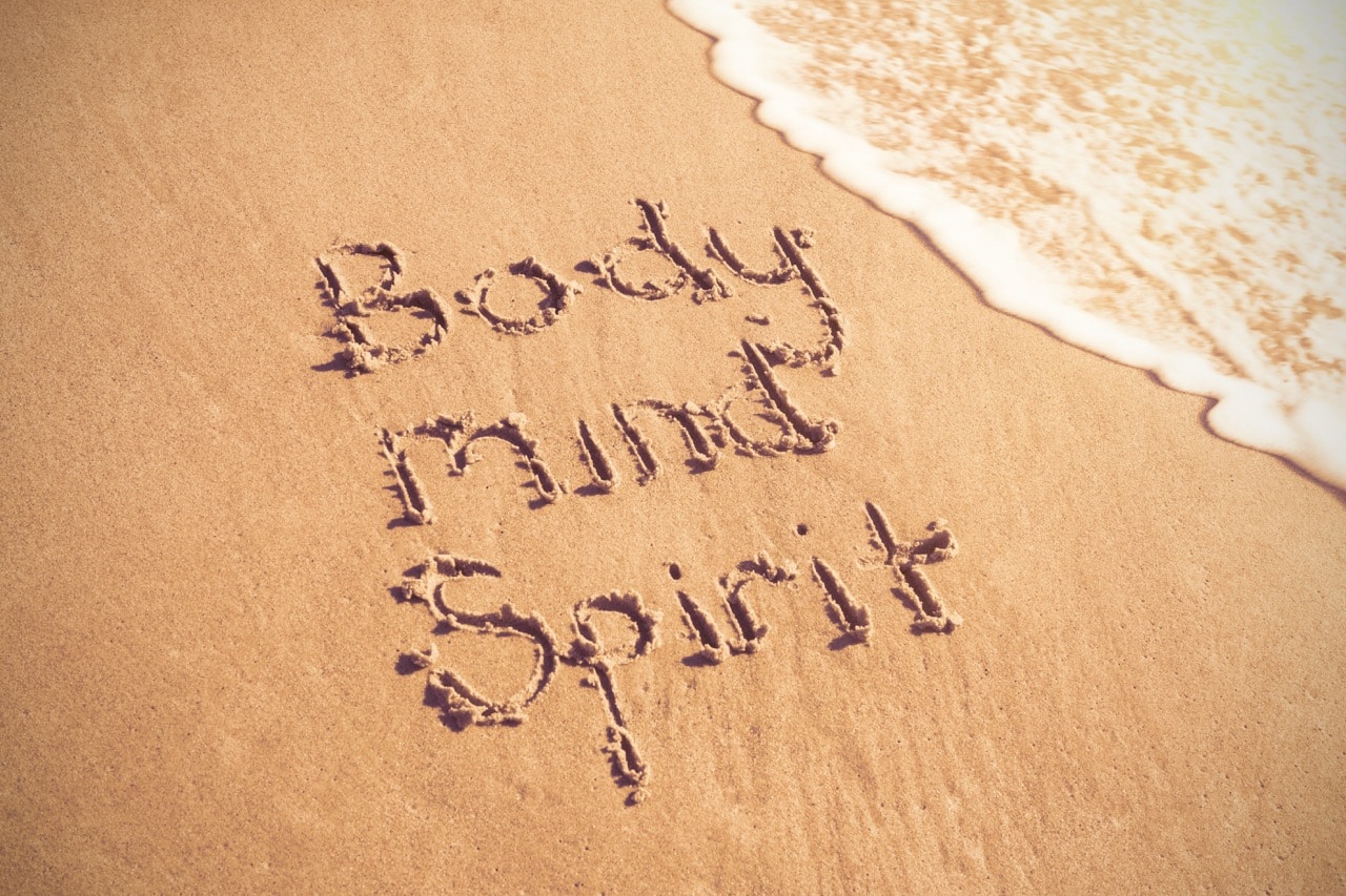 Body mind and spirit on the beach - improving mental health with an infrared sauna.